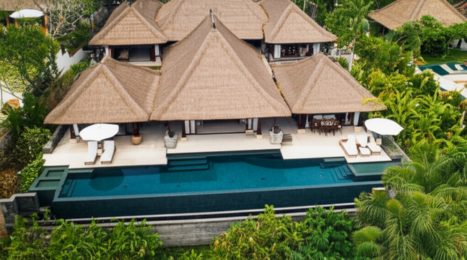 Aerial view of a Balinese villa, showcasing the integration of architecture with nature.