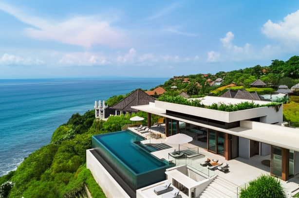 Luxury villa in Bali with infinity pool overlooking the ocean.